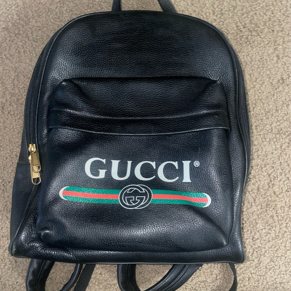 Gucci Black Leather Backpack with Gold Accents